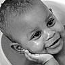 baby, black_and_white, cheek, child, close_up, cute, ear, expression, eyes, face, hand, happy, head, innocence, joy, person, portrait, skin, smiling, young_child