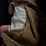 baby, sleeping, blanket, infant, cozy, soft, peaceful, hands, wrapped, white_clothing, portrait, indoors, rest, newborn, cute, child, skin, face, lying_down, dark_background
