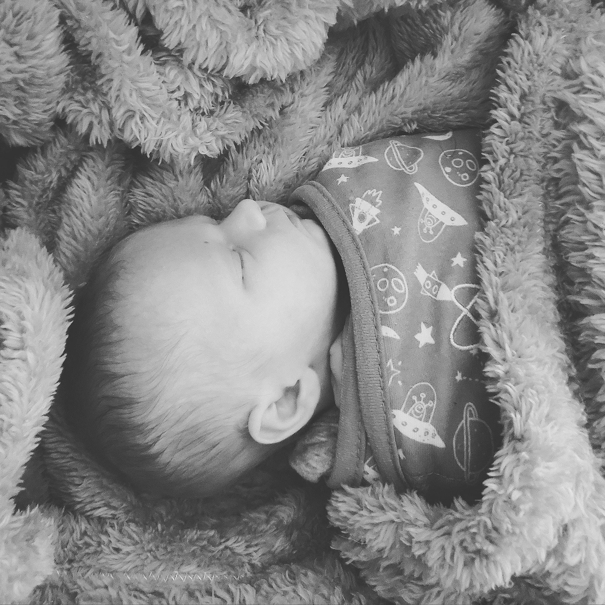 Nicholas is registered to the contest to win money with this photo: baby, black_and_white, child, fur, love, monochrome_photography, nap, nose, person, photography, sleep, smile