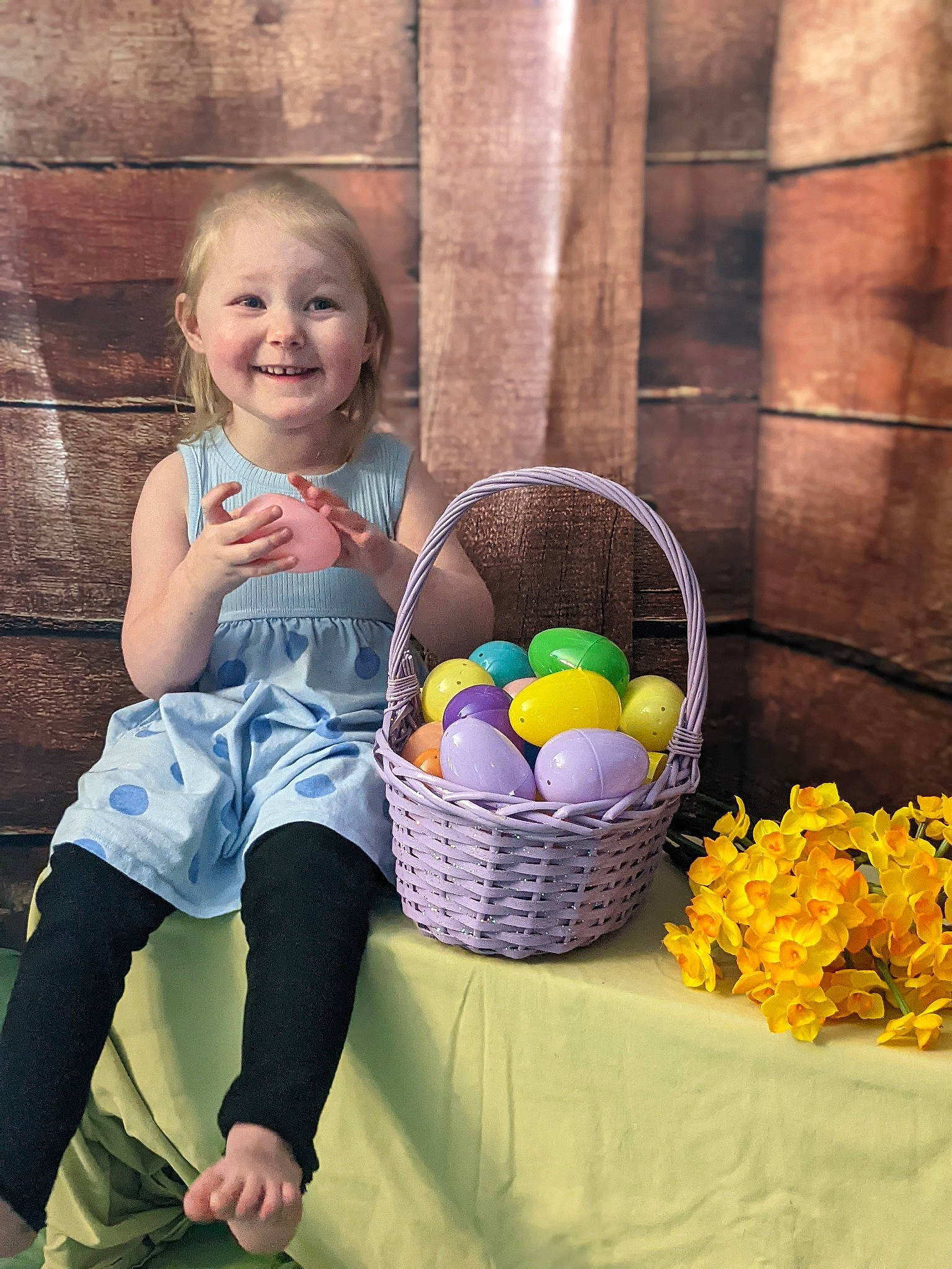 Hailey is registered to the contest to win money with this photo: basket, child, easter, easter_egg, electric_blue, event, flash_photography, fun, grass, happy, joy, leisure, people_in_nature, person, petal, recreation, sitting, smile, storage_basket, toddler