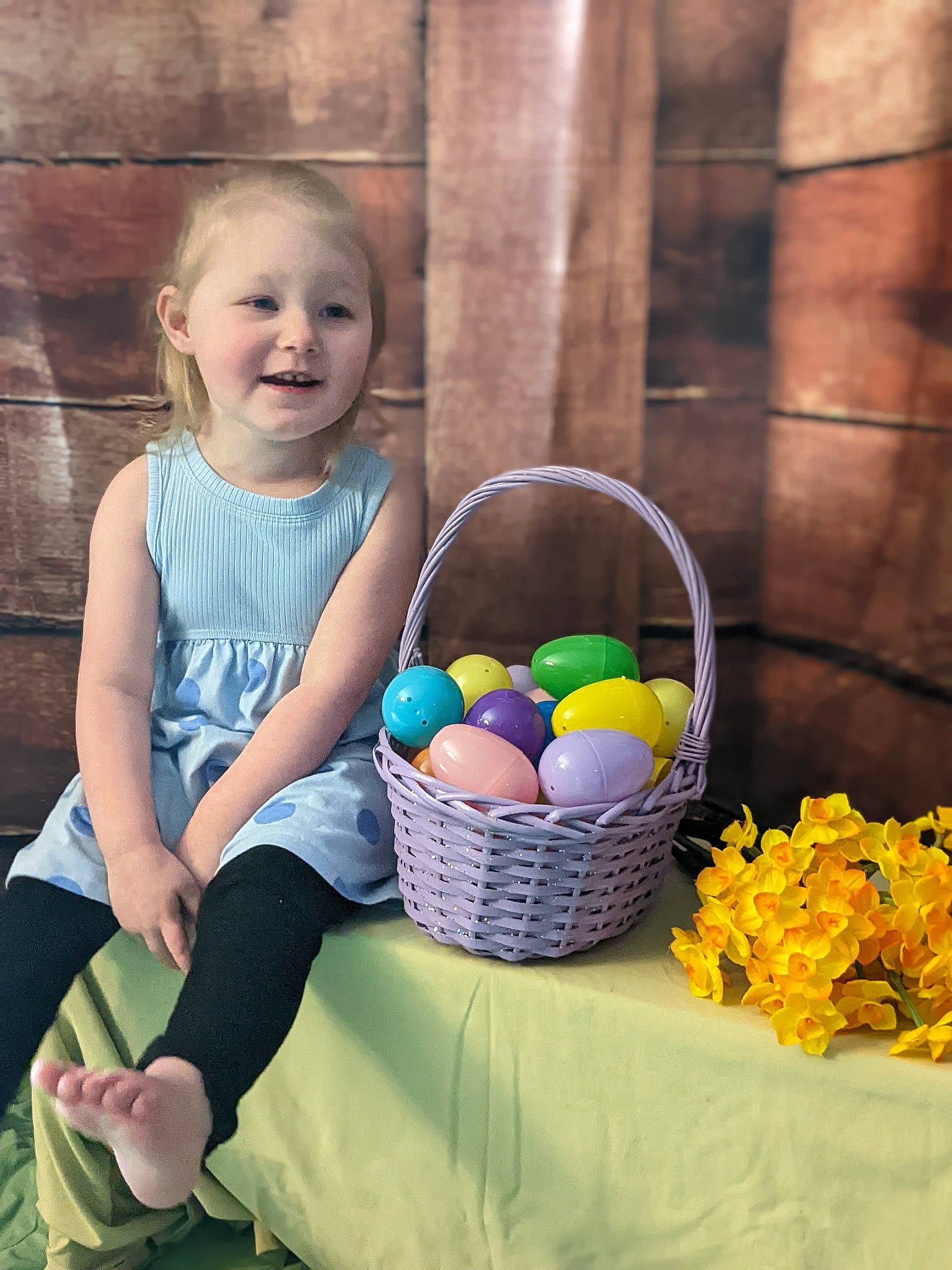 Hailey joined the competition — help win amazing prizes! baby_toddler_clothing, basket, child, easter, electric_blue, event, flower, fun, grass, happy, joy, leisure, pattern, people_in_nature, person, petal, picnic_basket, sitting, storage_basket, summer