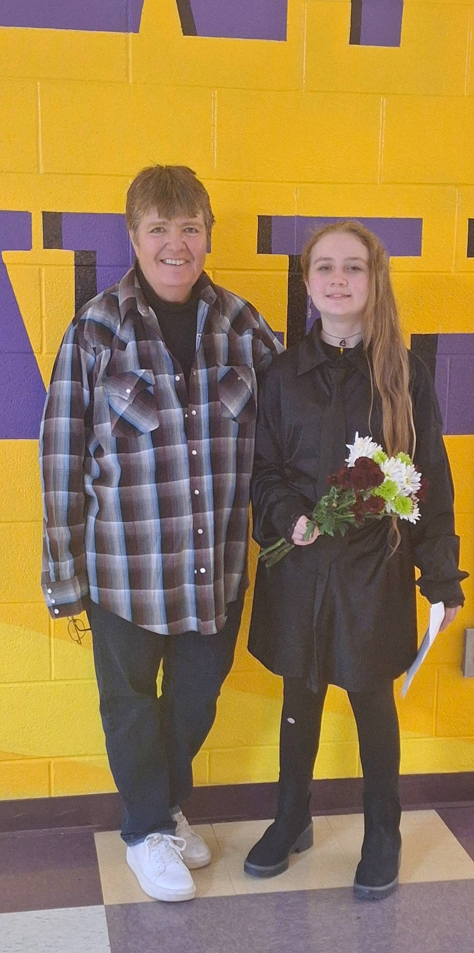Kyleigh is registered to the contest to win money with this photo: blazer, blouse, clothing, coat, face, flower, flowerarrangement, flowerbouquet, footwear, head, jacket, jeans, pants, person, photography, plant, portrait, pottedplant, shirt, shoe