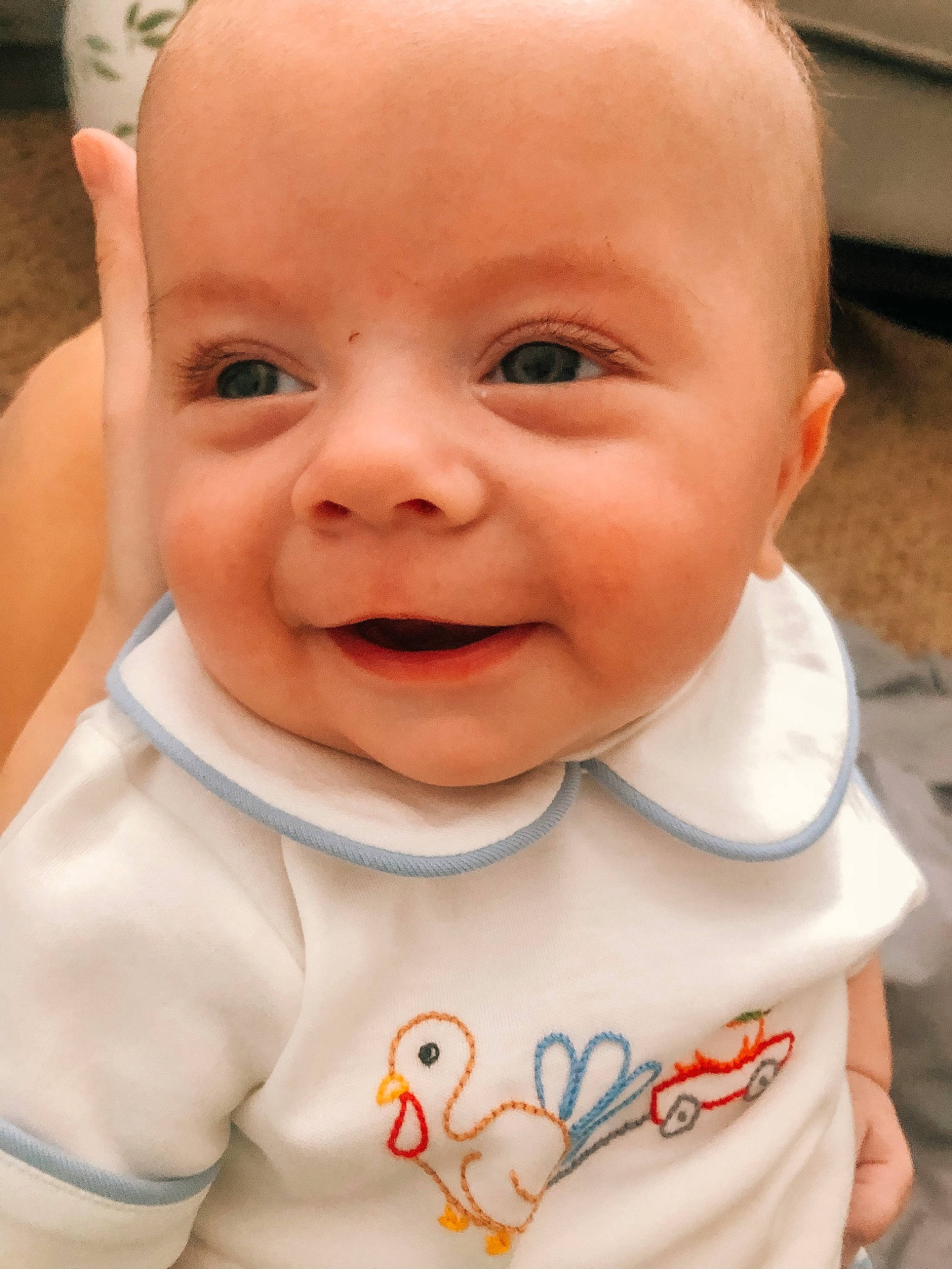 Judson is registered to the contest to win money with this photo: baby, baby_toddler_clothing, cheek, collar, eye, eyebrow, eyelash, finger, gesture, happy, iris, lip, mouth, nose, person, pink, product, skin, sleeve, smile
