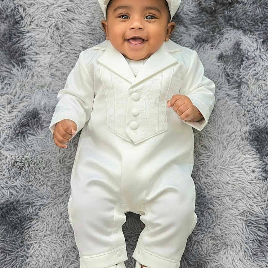 Mikhael joined the competition — help win amazing prizes! adorable, baby, baby_boy, cap, child, close_up, cute, fashion, formal_wear, happy, indoors, infant, lying_down, one_person, portrait, shoes, smiling, soft_rug, toddler, white_clothing