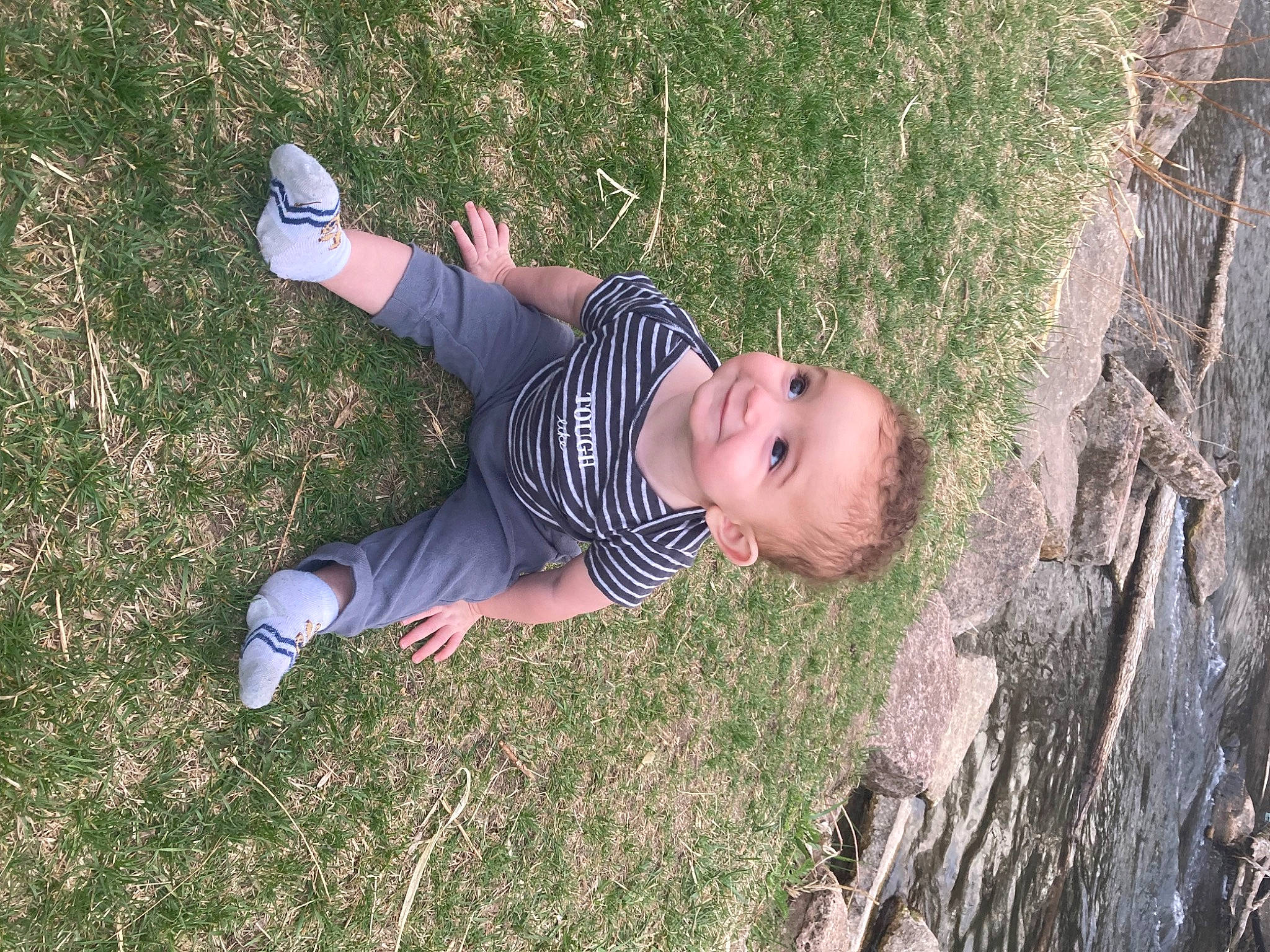 Kairen is registered to the contest to win money with this photo: baby, flash_photography, fun, grass, grass_family, grassland, happy, joy, landscape, leisure, people_in_nature, person, plant, recreation, shoe, smile, sneakers, soil, toddler, tree