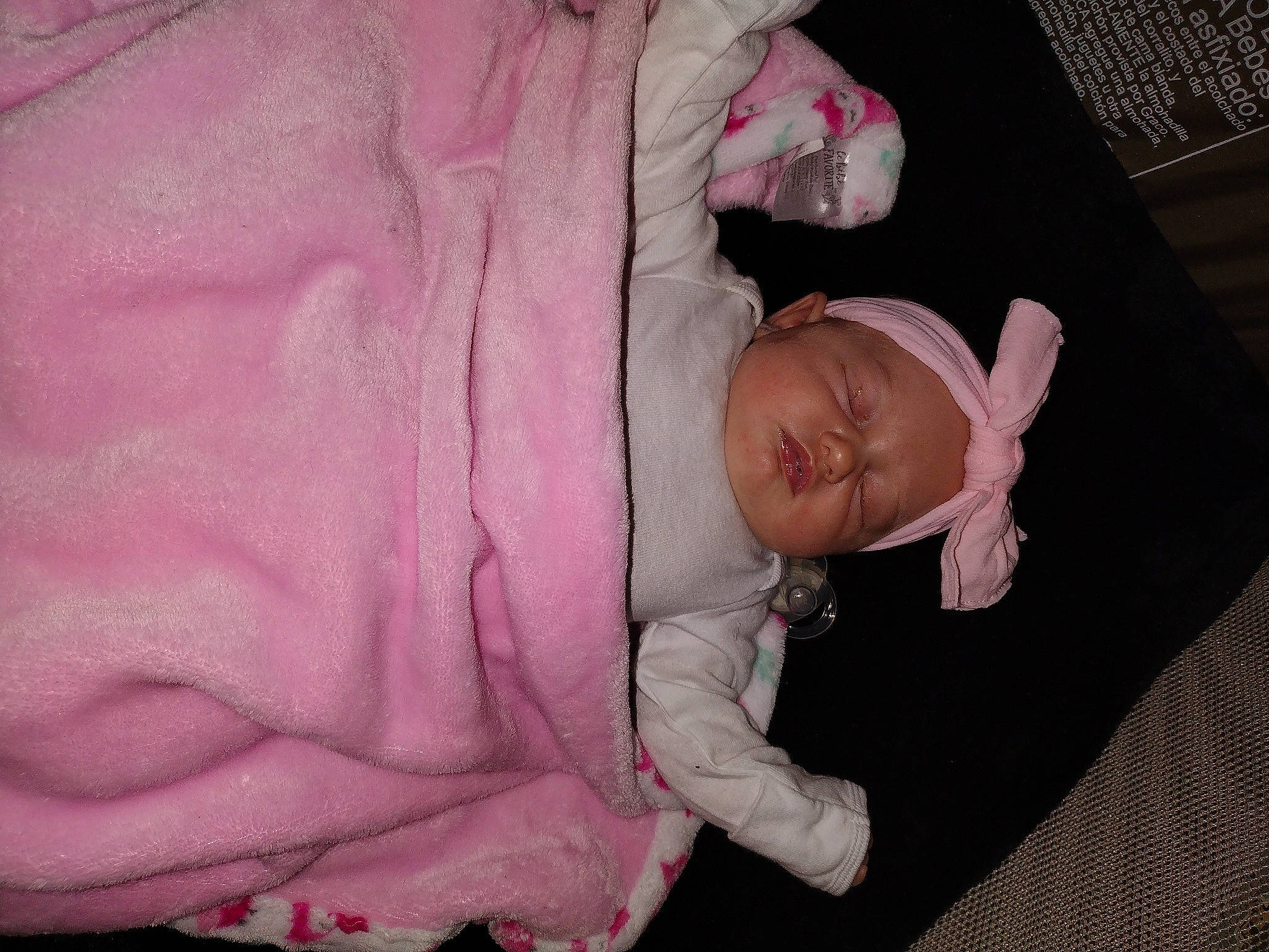 Lillian is registered to the contest to win money with this photo: baby, baby_products, baby_toddler_clothing, cheek, child, clothing, comfort, hand, linens, magenta, person, pink, purple, room, sitting, sleeve, toddler