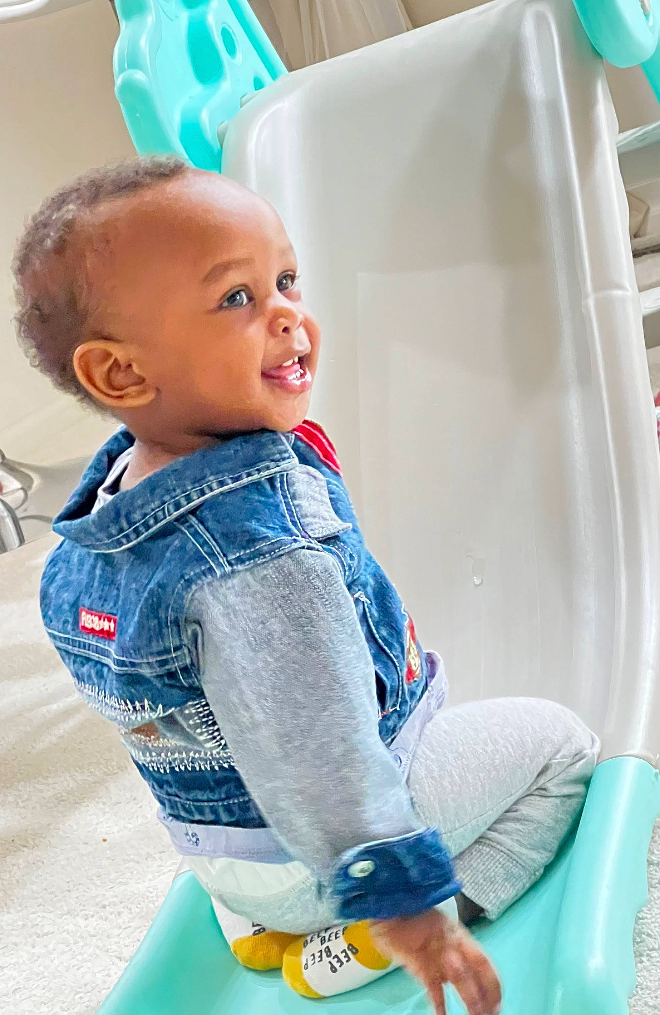 Kylian joined the competition — help win amazing prizes! baby, baby_playing_with_toys, baby_products, baby_toddler_clothing, blue, child, electric_blue, facial_expression, fun, green, happy, leisure, person, recreation, sitting, skin, sleeve, smile, t_shirt, toddler