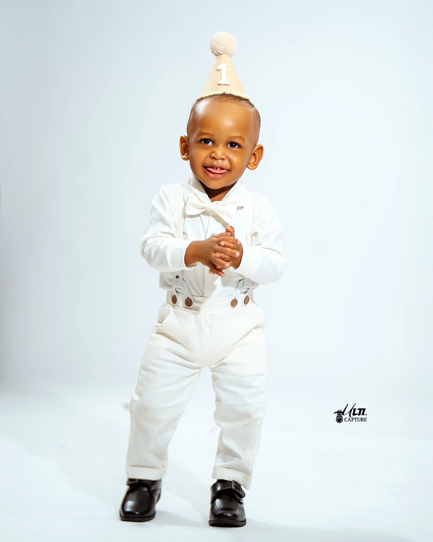 Kylian joined the competition — help win amazing prizes! arm, baby, baby_toddler_clothing, child, collar, costume, fashion_accessory, fashion_design, formal_wear, gesture, hand, happy, head, human_body, joy, person, sleeve, smile, suit, thumb