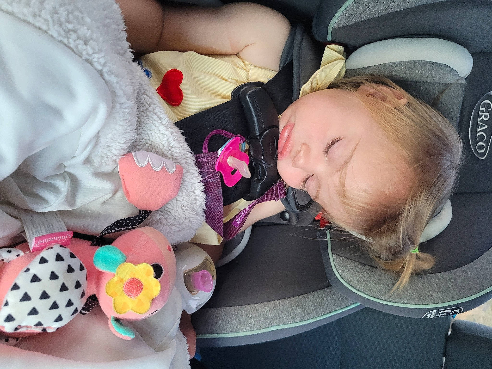 Estella joined the competition — help win amazing prizes! baby, baby_carriage, baby_products, baby_toddler_clothing, car_seat, carmine, cheek, child, comfort, fashion_accessory, fun, happy, headgear, linens, pattern, person, pink, product, smile, toddler