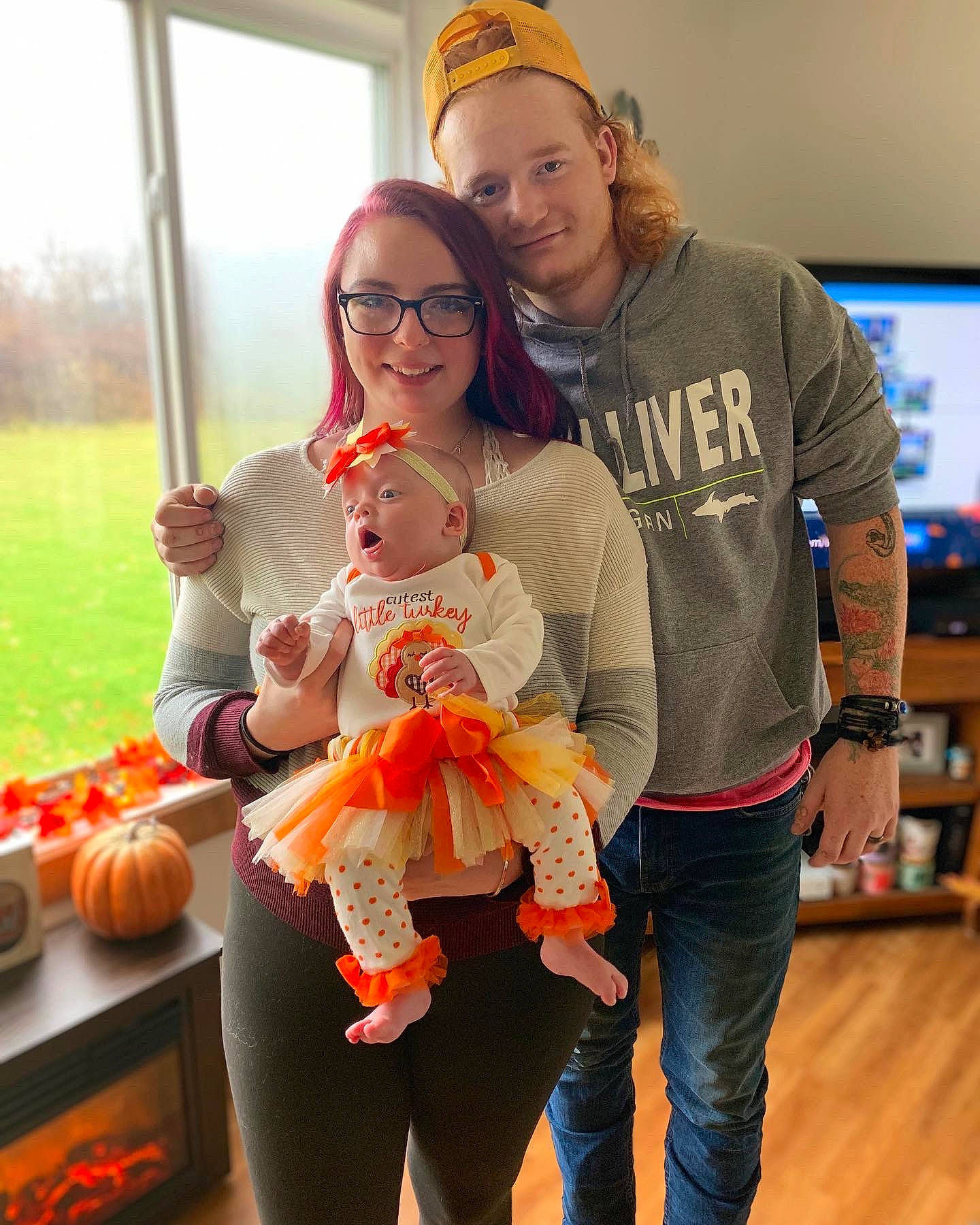 Brynleigh is registered to the contest to win money with this photo: baseball_cap, cap, community, fun, glasses, happy, hat, head, headwear, jeans, joy, leisure, mammal, orange, people, person, recreation, smile, t_shirt, television