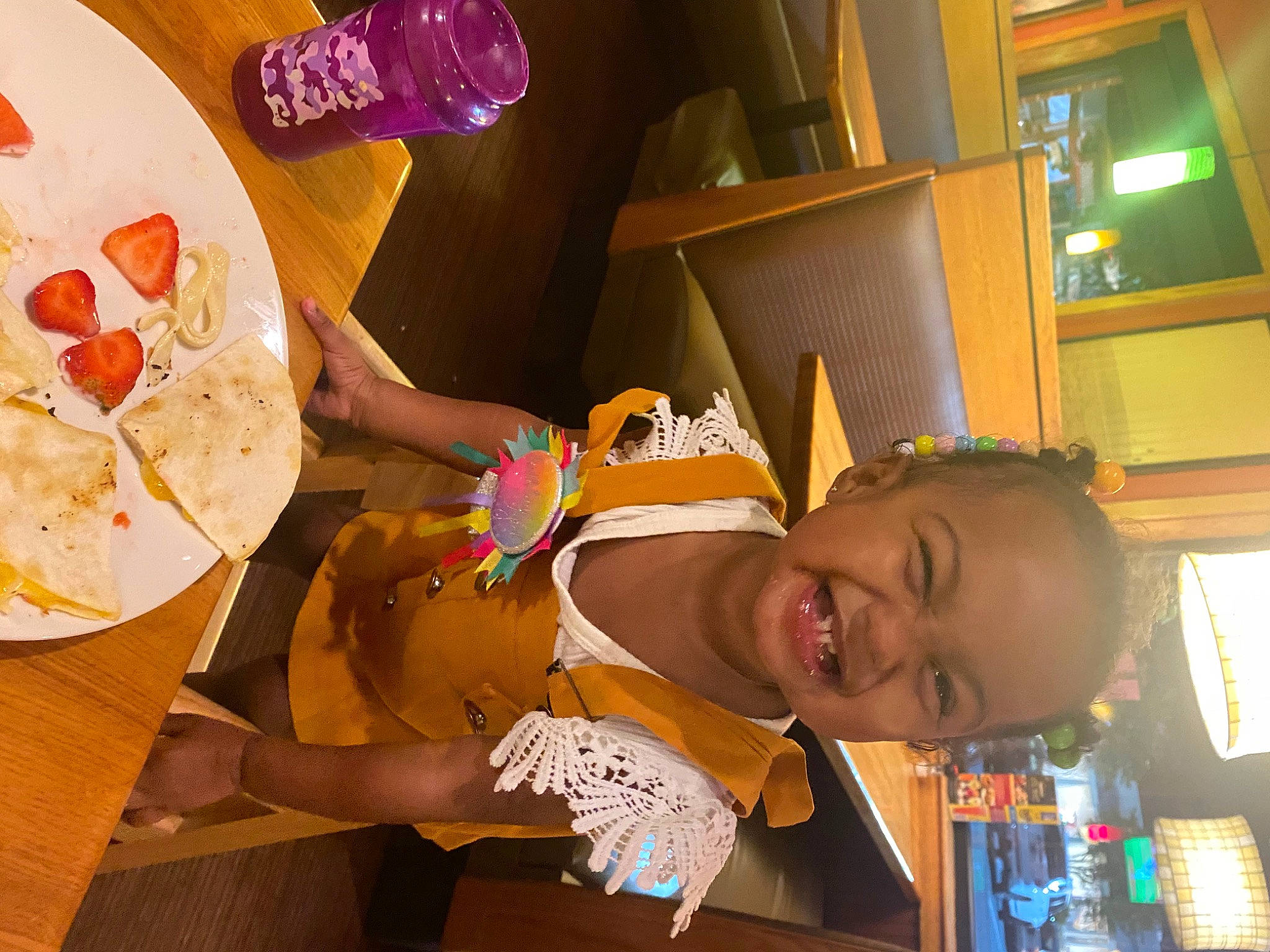 Peyton is registered to the contest to win money with this photo: child, comfort_food, cooking, dish, fast_food, food, fun, happy, hat, ingredient, leisure, orange, party_supply, person, play, recipe, room, smile, t_shirt, table