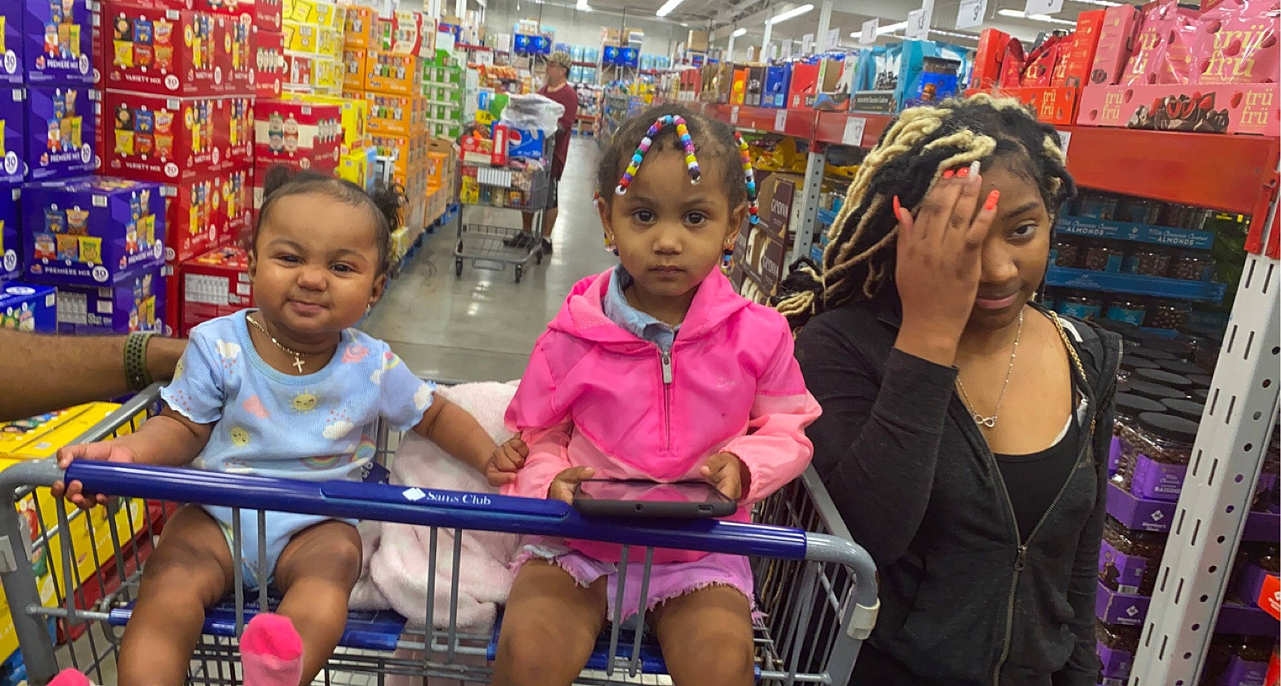 Peyton joined the competition — help win amazing prizes! chair, child, city, convenience_store, customer, event, fun, happy, headwear, leisure, magenta, person, public_space, recreation, retail, shelf, shopping, shorts, t_shirt, thigh