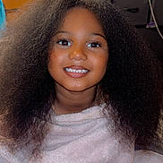 Peyton Carter joined the competition — help win amazing prizes! child, smiling, hair, towel, indoor, portrait, face, happy, person, cozy, furniture, cabinet, bottle, cup, black_hair, young, cute, expression, skin, eyes