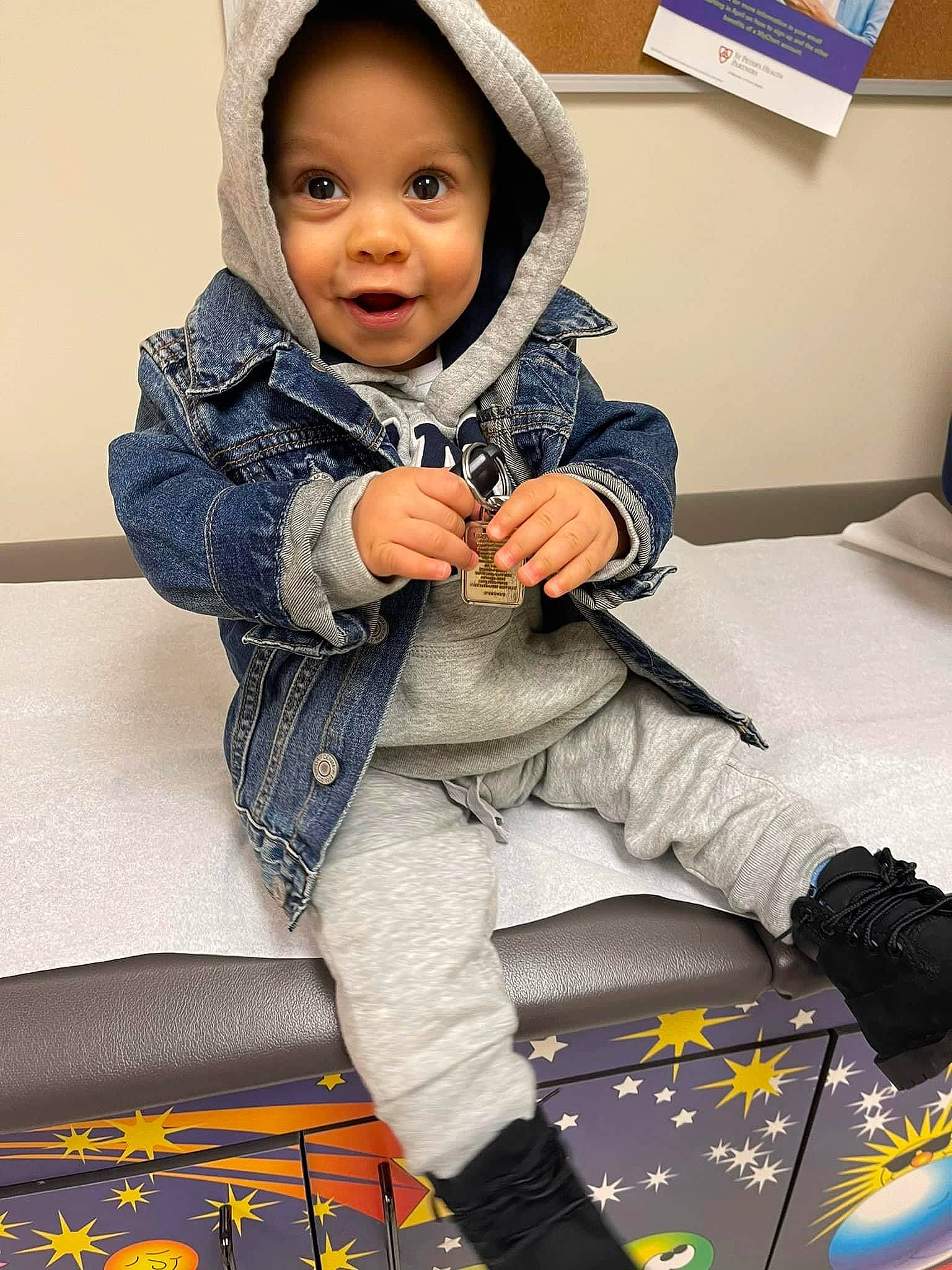 Zereem joined the competition — help win amazing prizes! arm, baby, baby_toddler_clothing, black, chair, child, comfort, electric_blue, face, flooring, head, outerwear, pattern, person, photograph, skin, sleeve, smile, surprise, thigh