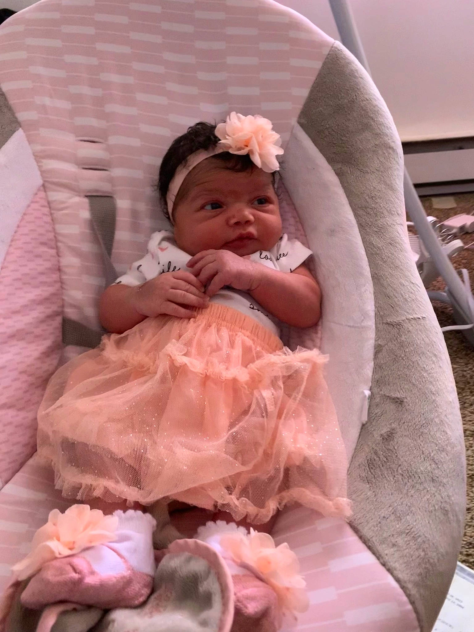 Mylah is registered to the contest to win money with this photo: baby, baby_products, baby_safety, baby_toddler_clothing, cheek, child, comfort, happy, hat, headwear, linens, magenta, peach, person, petal, pink, product, rose, rose_family, rose_order