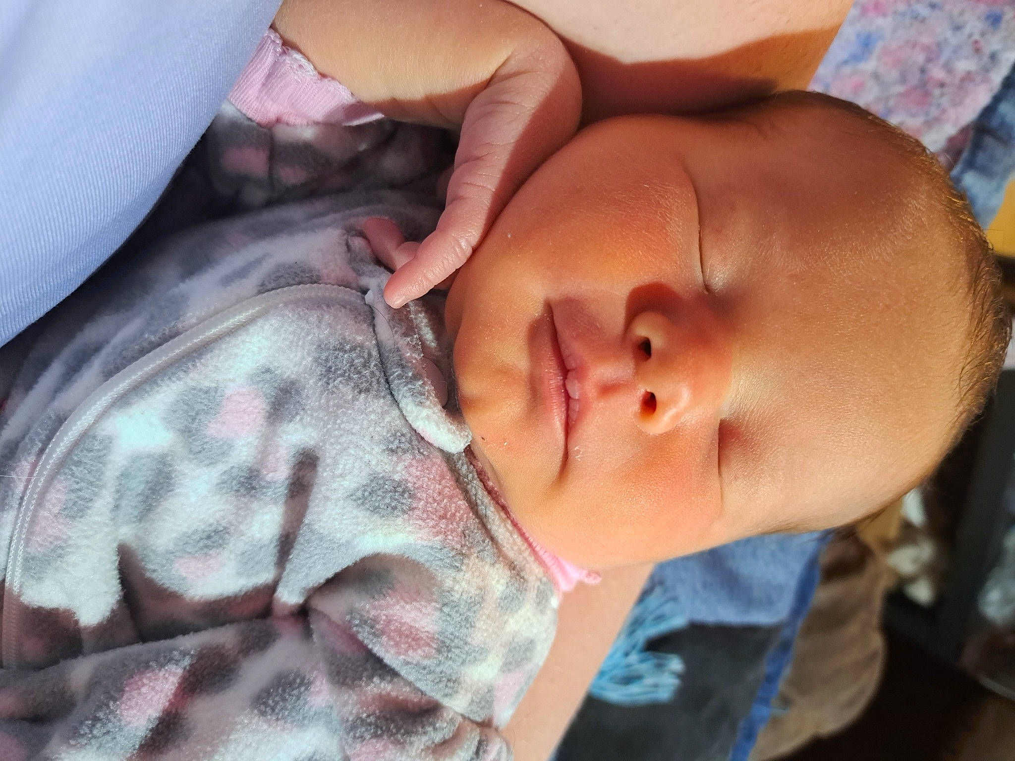 Lucky is registered to the contest to win money with this photo: baby, baby_products, baby_sleeping, baby_toddler_clothing, bedtime, cheek, child, childbirth, comfort, eyelash, happy, linens, lip, mouth, nap, nose, pattern, person, skin, thumb