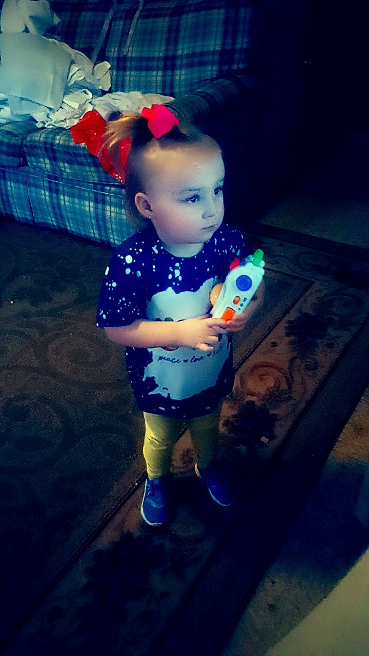 Legacy is registered to the contest to win money with this photo: azure, baby, baby_toddler_clothing, electric_blue, flash_photography, floor, flooring, fun, happy, human_leg, pattern, person, purple, sandal, sitting, sneakers, standing, tartan, thigh, tints_and_shades