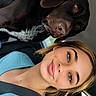 Penelope is registered to the contest to win money with this photo: woman, dog, labrador, car, selfie, seatbelt, blue_eyes, nose_ring, casual_clothing, short_hair, brown_dog, interior, window, nature_outside, portrait, happy, pet, companion, daylight, closeup