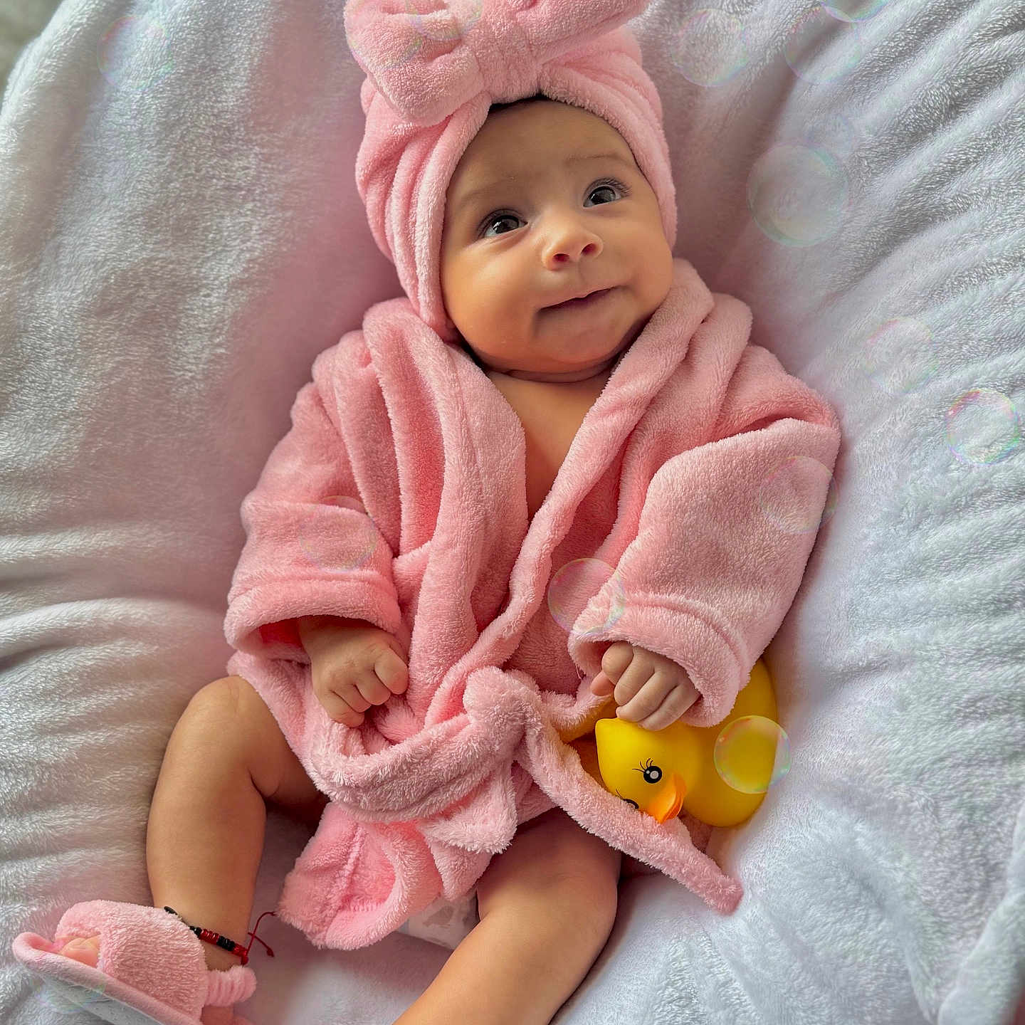 Ainara joined the competition — help win amazing prizes! baby, blanket, face, happy, head, newborn, person, photography, portrait, quilt, smile, towel