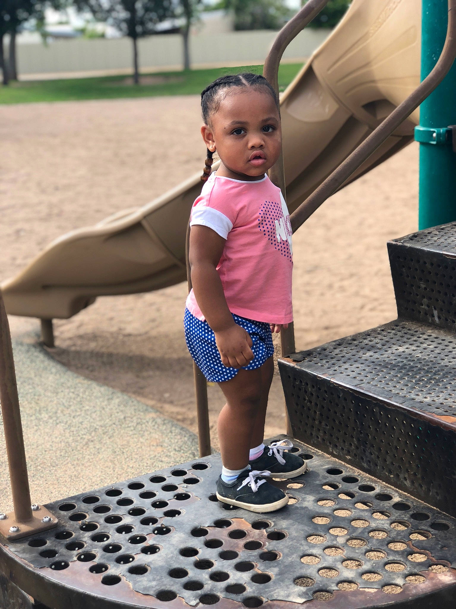 Kenya is registered to the contest to win money with this photo: child, city, daughter, fun, games, human_settlement, leisure, park, people, person, pink, play, playground, public_space, recreation, smile, summer, toddler, vacation, water