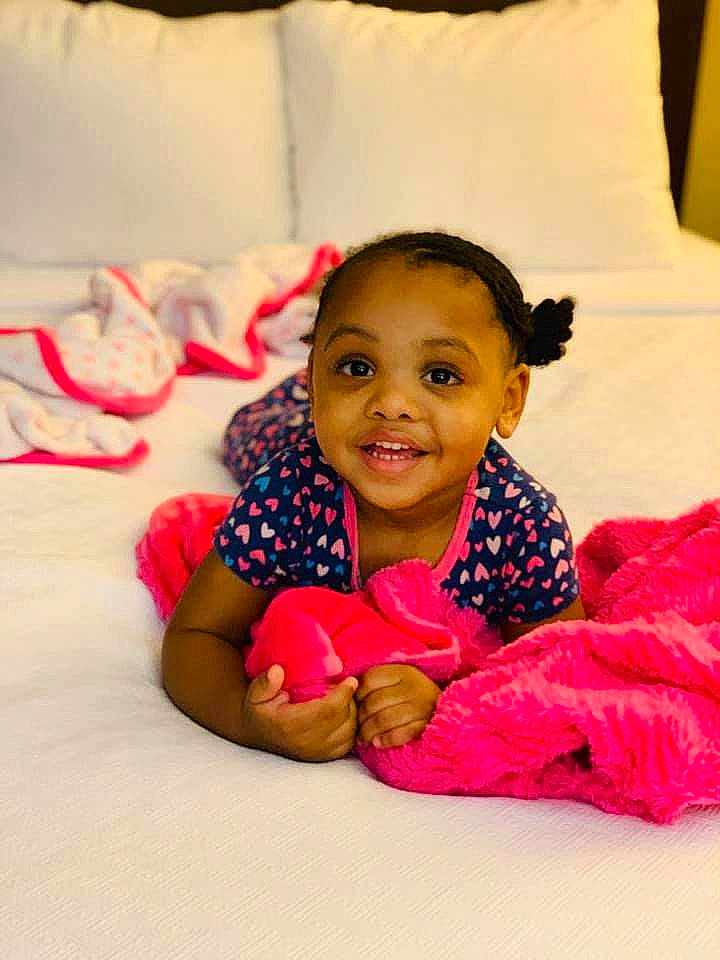 Kenya joined the competition — help win amazing prizes! baby, cheek, child, daughter, face, fun, happy, head, joy, lip, person, pink, play, sitting, skin, smile, toddler