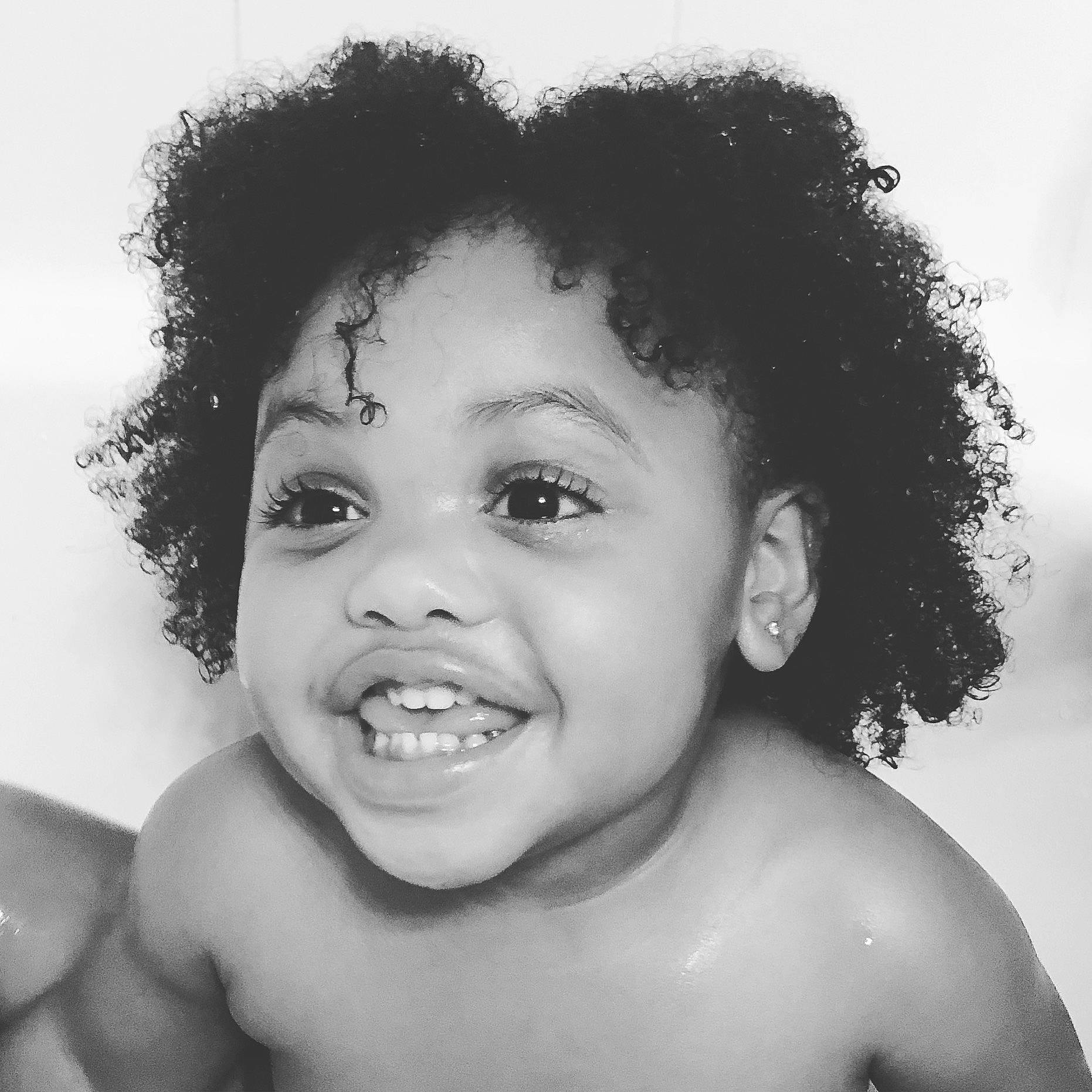 Kenya is registered to the contest to win money with this photo: afro, beauty, black, black_and_white, cheek, child, chin, eyebrow, face, facial_expression, forehead, hair, hairstyle, head, joy, lip, nose, person, photograph, skin