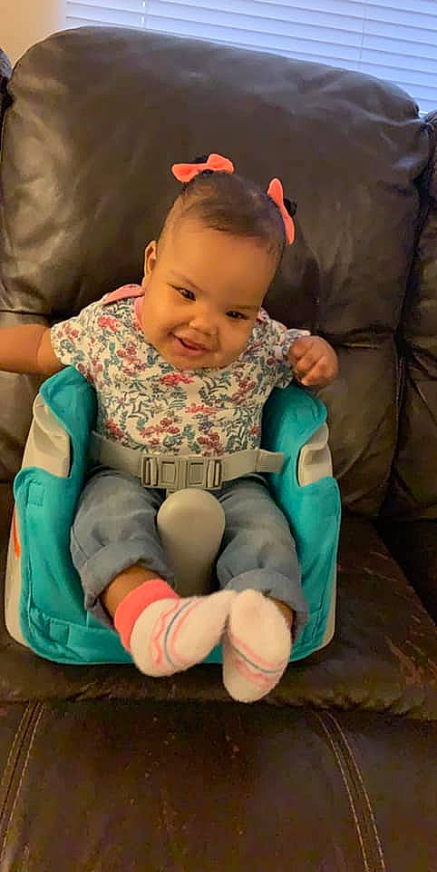 Xariya is registered to the contest to win money with this photo: arm, baby, child, comfort, joy, person, play, sitting, toddler