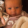 baby, blanket, child, closeup, clothing, comfort, cute, expression, eyes, face, head, holding, indoor, infant, plush_toy, portrait, skin, soft_texture, warm, young