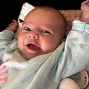Gabrielle participe au concours pour gagner de l'argent avec cette photo : baby, smiling, infant, face, arms_up, clothing, pacifier, blanket, soft_toys, cute, child, happy, portrait, closeup, indoors, newborn, expression, cozy, comfort, skin
