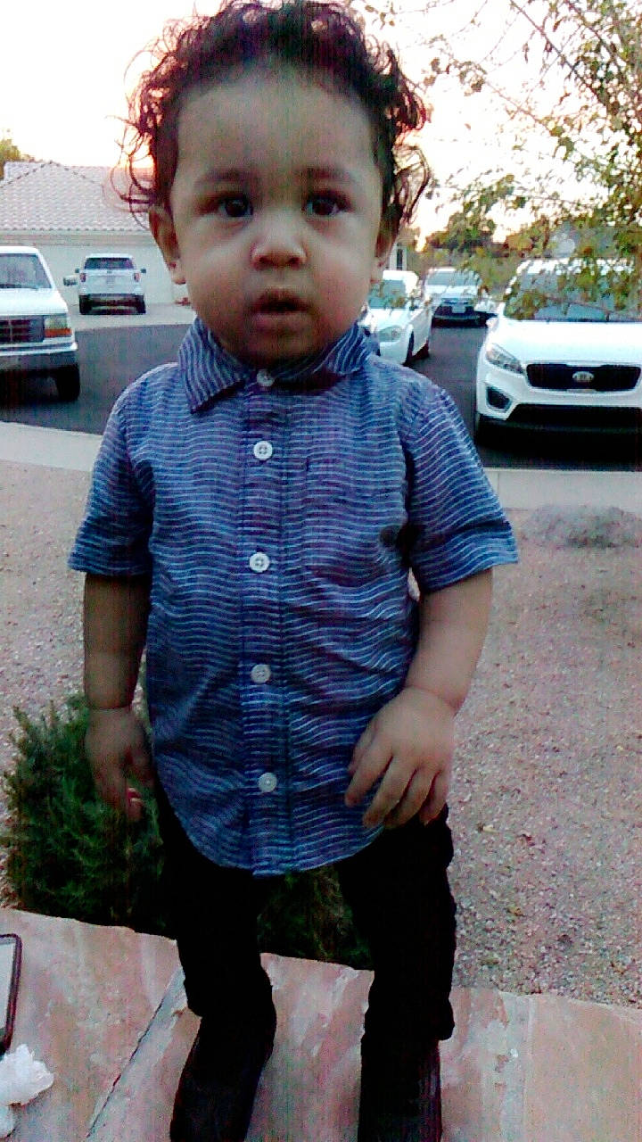 Aiden is registered to the contest to win money with this photo: car, cheek, child, child_model, cool, design, jeans, luxury_vehicle, male, pattern, person, photography, sleeve, smile, standing, t_shirt, toddler, vehicle