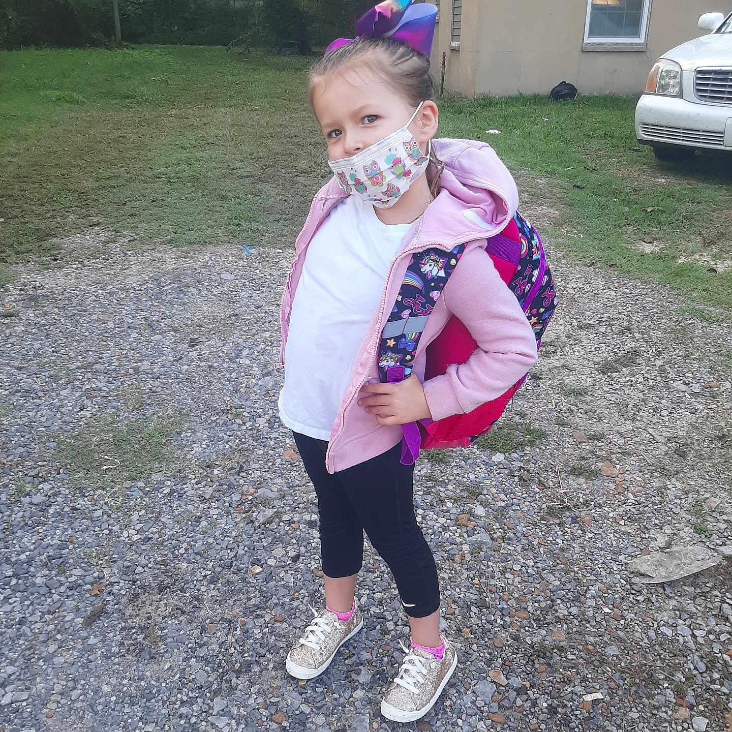 Brianna joined the competition — help win amazing prizes! alloywheel, car, carwheel, child, clothing, coat, female, footwear, girl, gravel, machine, person, road, shoe, sneaker, spoke, tire, transportation, vehicle, wheel