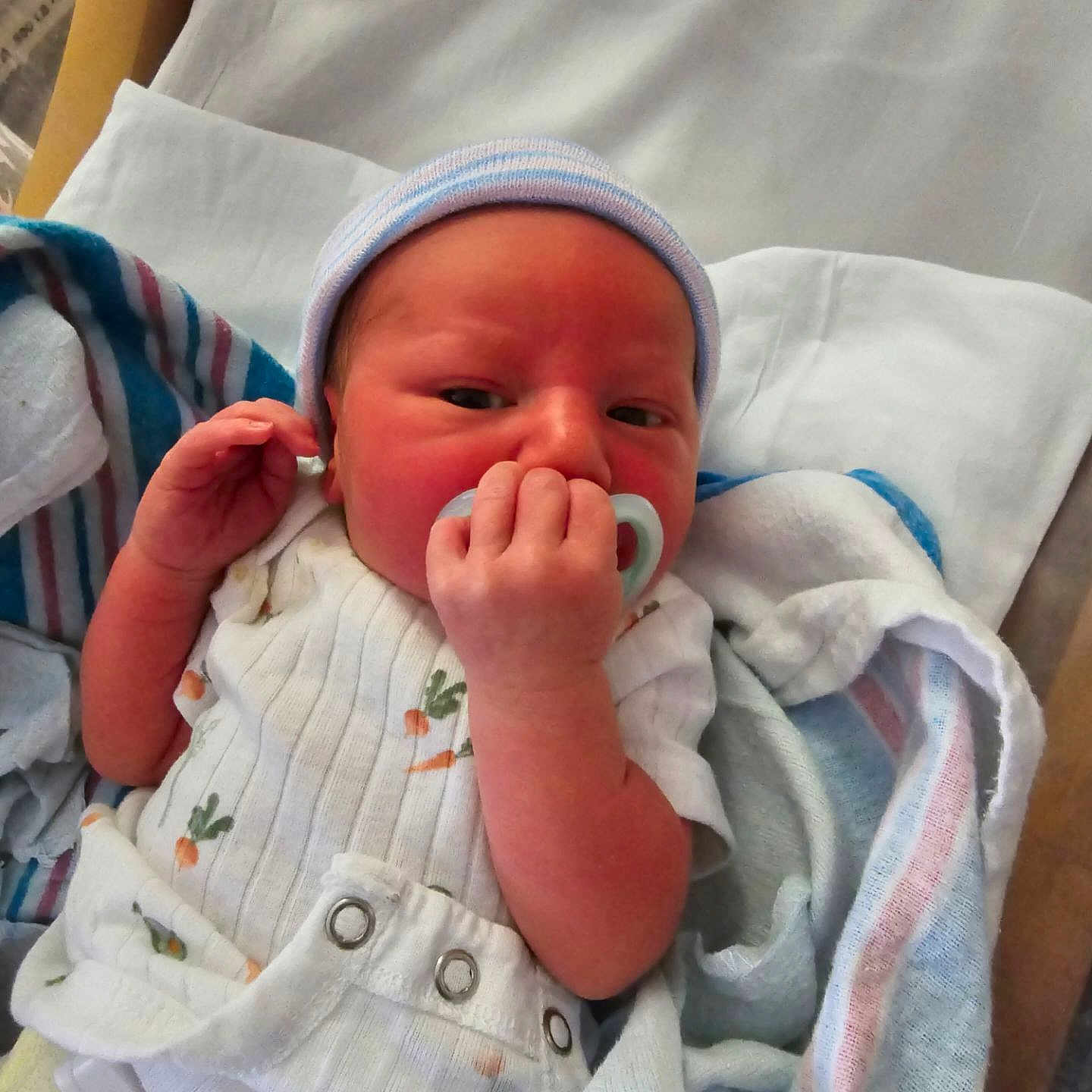 Mylo joined the competition — help win amazing prizes! architecture, baby, bed, blanket, building, clothing, cushion, face, furniture, glove, hat, head, homedecor, hospital, newborn, person, photography, portrait, quilt, sleeping