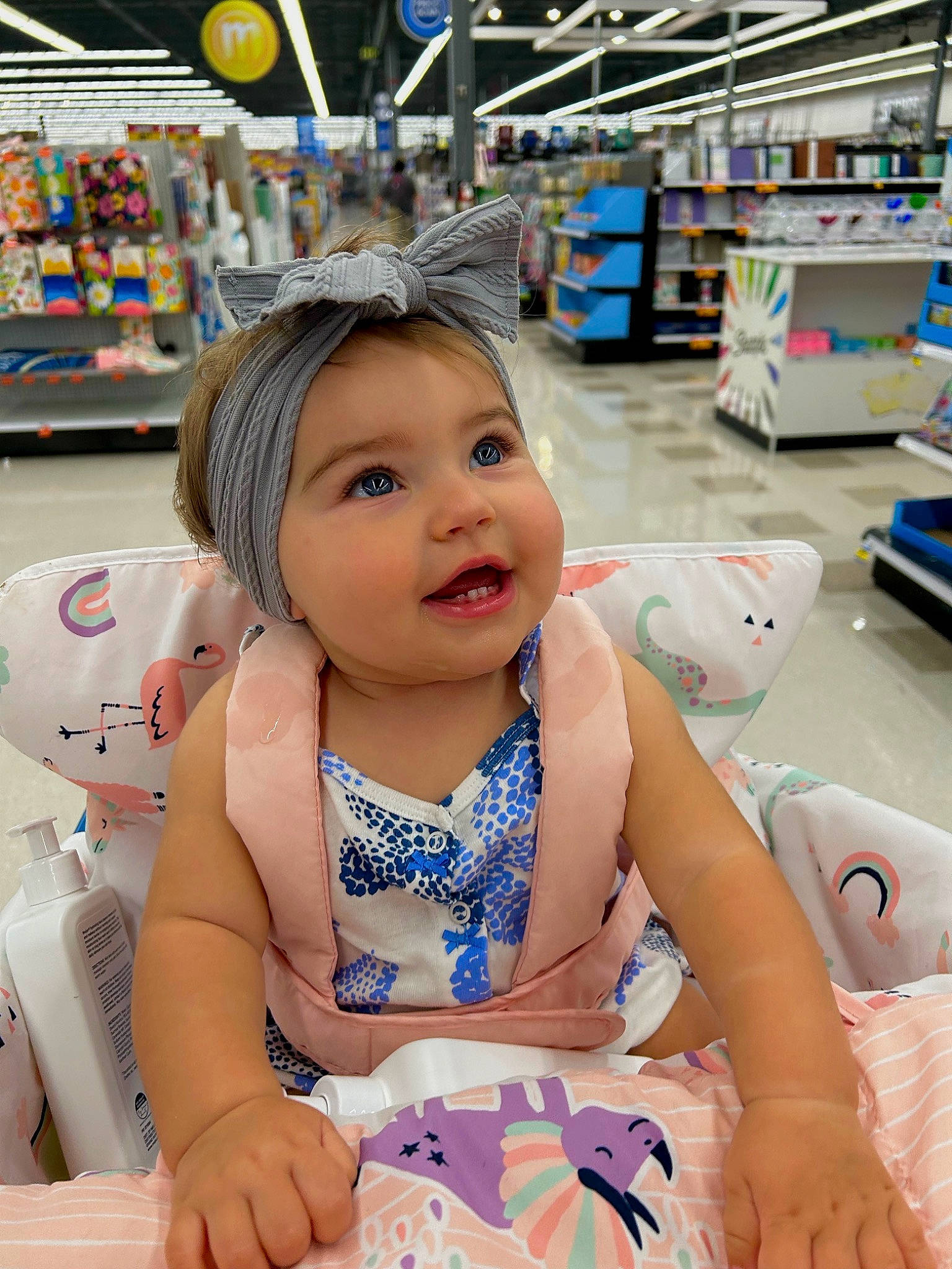 Amaya is registered to the contest to win money with this photo: baby, baby_toddler_clothing, child, convenience_store, customer, fashion_accessory, fun, happy, headwear, leisure, person, play, product, retail, shelf, sitting, skin, smile, snapshot, toddler