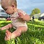 baby, grass, outdoor, child, sitting, curious, sunlight, nature, greenery, daylight, infant, foot, hand, shirt, shorts, head, profile, skin, person, young