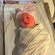 Persephone joined the competition — help win amazing prizes! newborn, baby, sleeping, hospital, blanket, bassinet, bow_hat, wrapped, infant, cute, peaceful, soft_lighting, portrait, headwear, indoors, child, baby_face, resting, fabric, hospital_bed