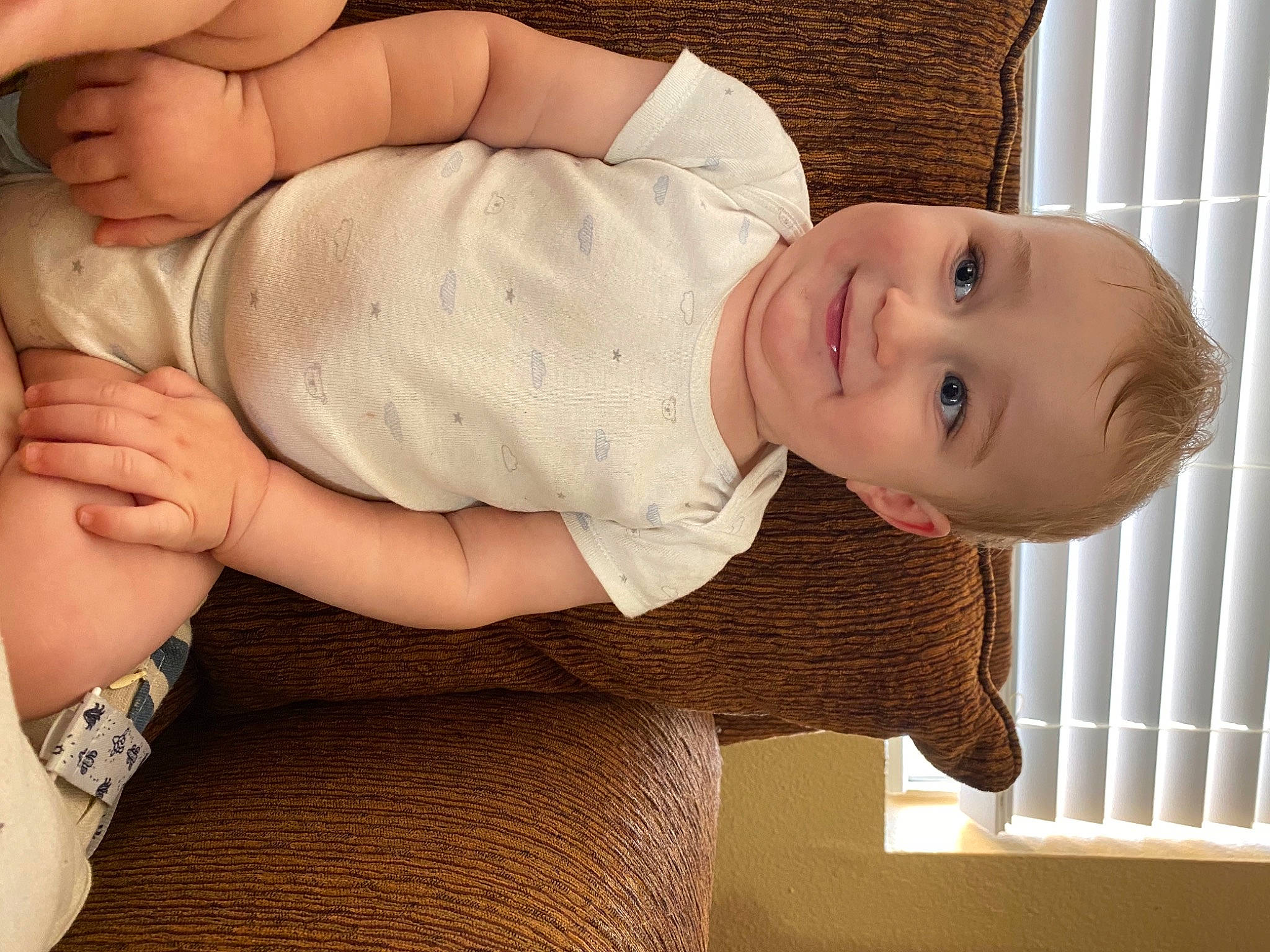 Augustus is registered to the contest to win money with this photo: abdomen, baby, baby_products, baby_toddler_clothing, cheek, child, finger, human, joint, joy, nail, organ, person, product, skin, sock, throat, thumb, toddler