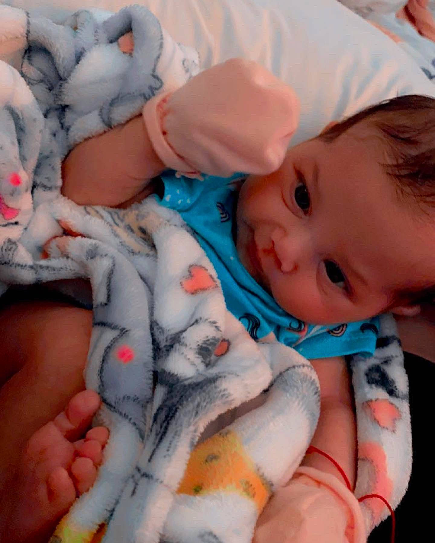 Mallory joined the competition — help win amazing prizes! azure, baby, baby_toddler_clothing, cheek, child, comfort, eye, finger, gesture, hand, human_body, iris, mouth, nail, person, photograph, skin, textile, thumb, toddler