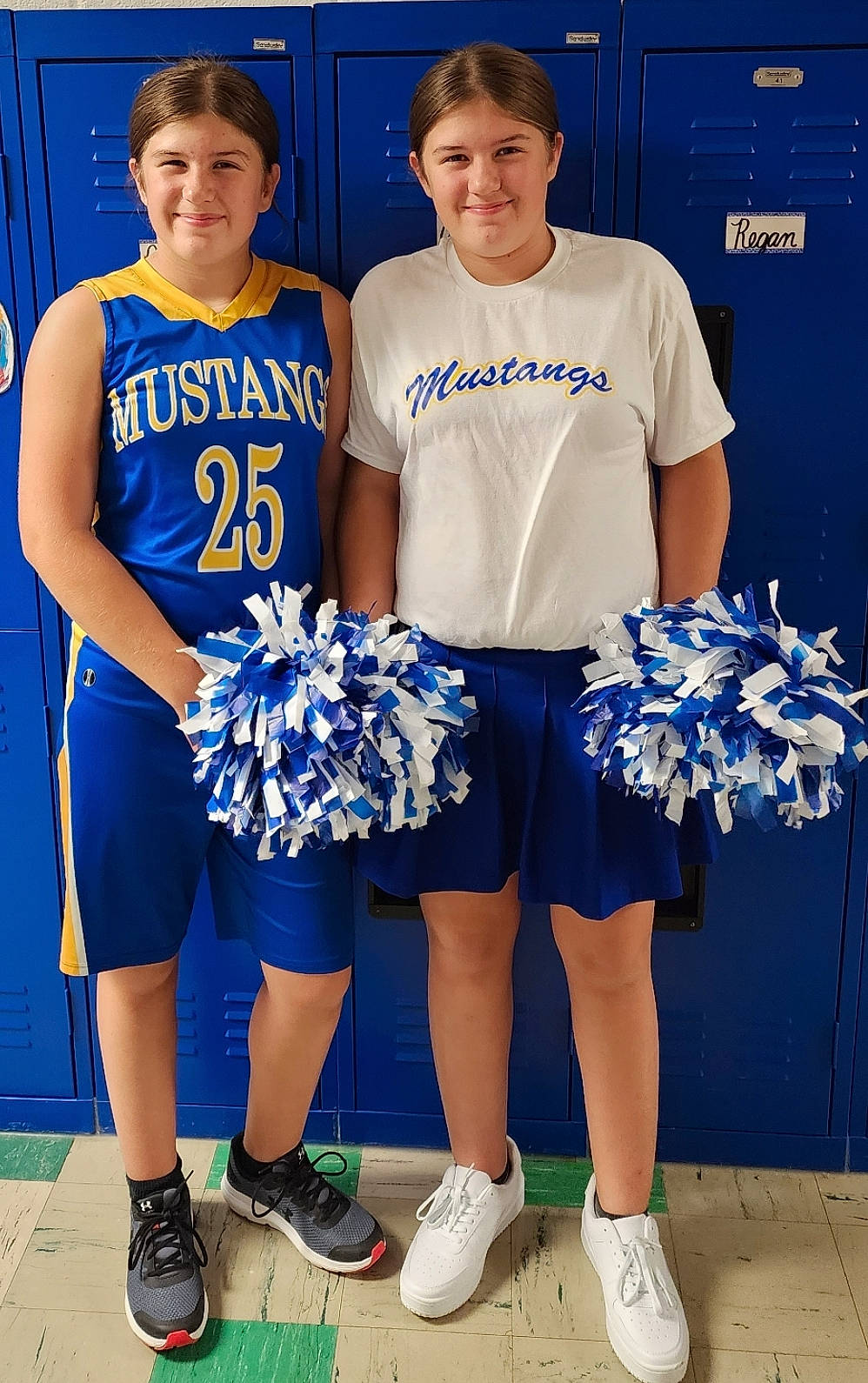 Riley is registered to the contest to win money with this photo: blue, championship, cheerleading_uniform, competition_event, electric_blue, jersey, joy, person, player, shoe, shorts, smile, sneakers, sports, sports_jersey, sports_uniform, sportswear, t_shirt, team, team_sport