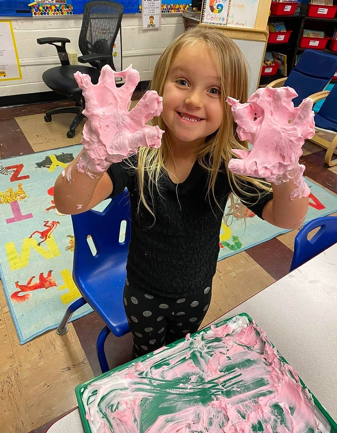 Kinlee joined the competition — help win amazing prizes! chair, child, finger, fun, hairstyle, happy, joy, linens, pattern, person, pink, play, room, shorts, sleeve, smile, stuffed_toy, t_shirt, thumb, toddler