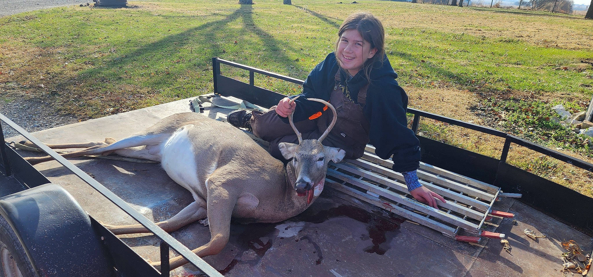 Elaina is registered to the contest to win money with this photo: bovine, deer, fun, grass, horn, joy, kangaroo, landscape, leisure, livestock, macropodidae, marsupial, pack_animal, person, plant, recreation, sitting, smile, soil, terrestrial_animal