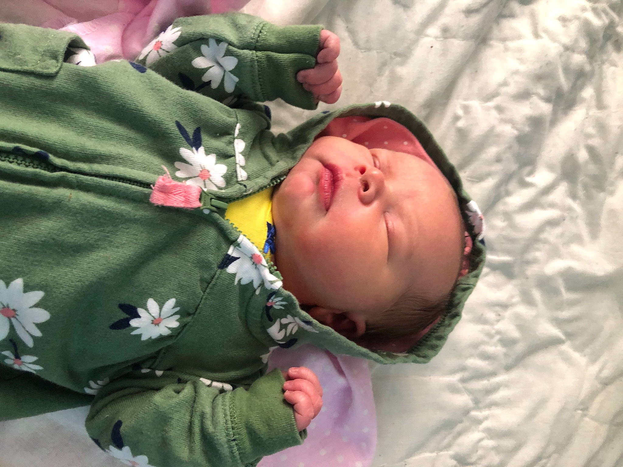 Kyra is registered to the contest to win money with this photo: baby, baby_products, baby_toddler_clothing, bedtime, cheek, child, comfort, eye, grass, hand, head, human_body, linens, nap, pattern, person, plant, skin, sleeve, toddler