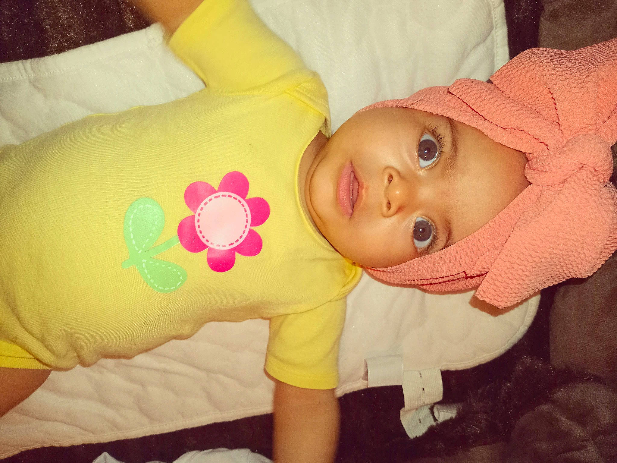 Ocean is registered to the contest to win money with this photo: baby_products, baby_toddler_clothing, baby_toys, bib, cheek, headwear, linens, peach, person, pink, plush, stuffed_toy, yellow