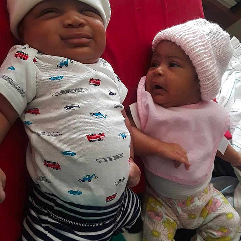 Malcolm is registered to the contest to win money with this photo: baby, bonnet, child, headwear, person, toddler