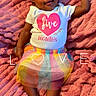 baby, infant, child, portrait, smiling, happy, lying_down, pink_blanket, bow, headband, tutu, skirt, rainbow, white_shirt, five_months, indoor, bed, text_overlay, cute, photography