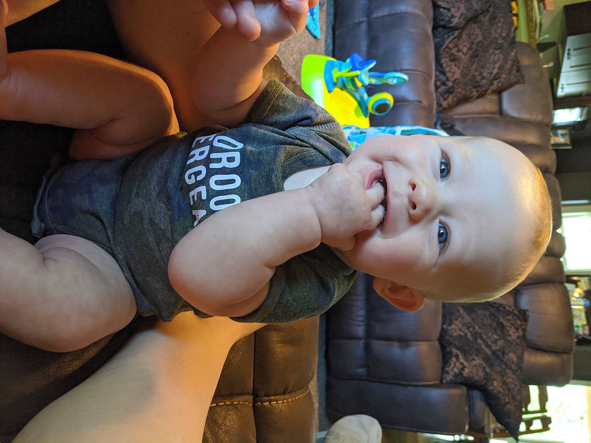 Theo is registered to the contest to win money with this photo: baby, child, fun, hand, muscle, person, skin, toddler, vacation