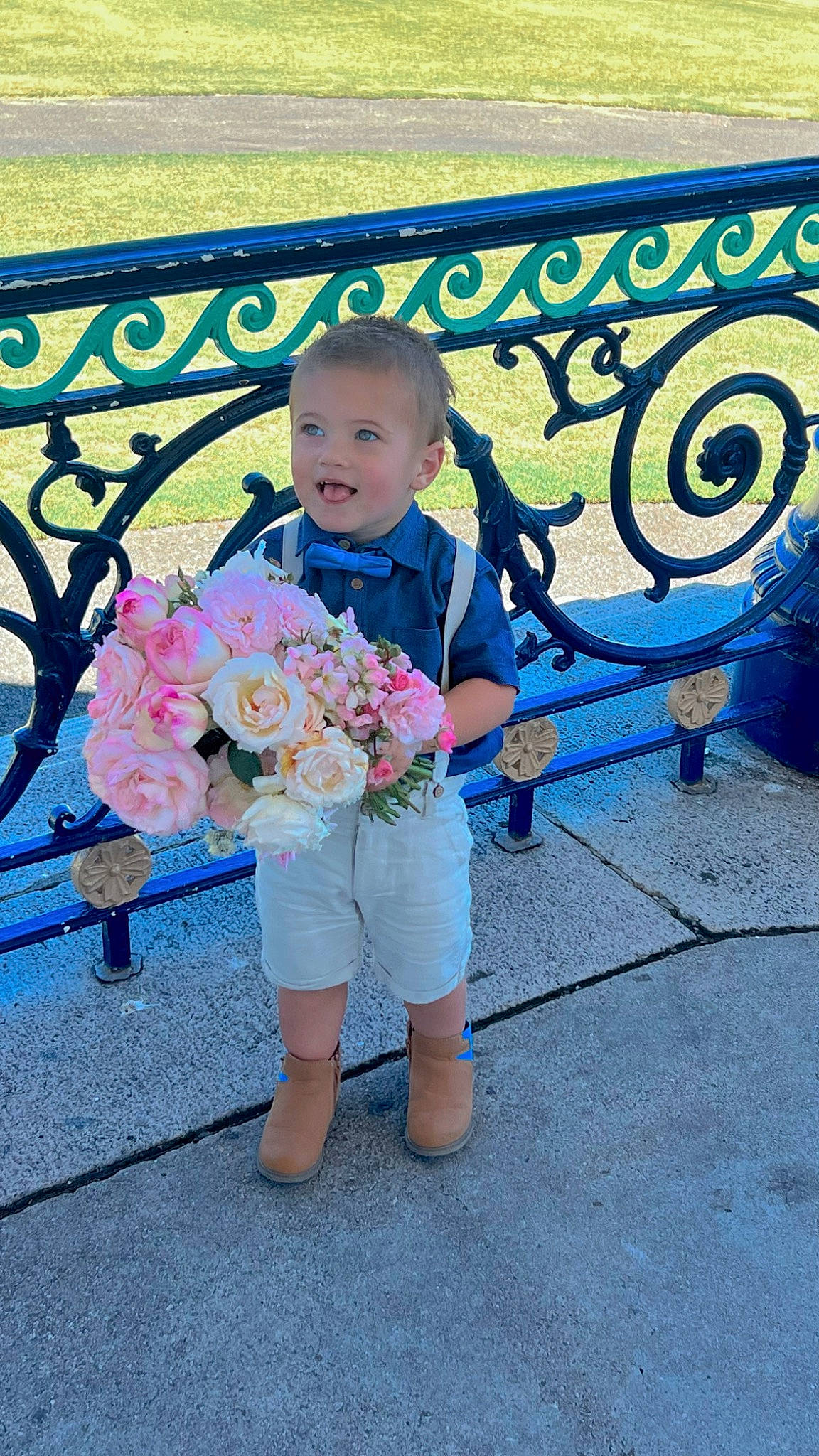 Henley joined the competition — help win amazing prizes! baby_toddler_clothing, blue, child, electric_blue, flower, fun, grass, happy, hat, leisure, pattern, people_in_nature, person, petal, pink, plant, sandal, sitting, t_shirt, toddler