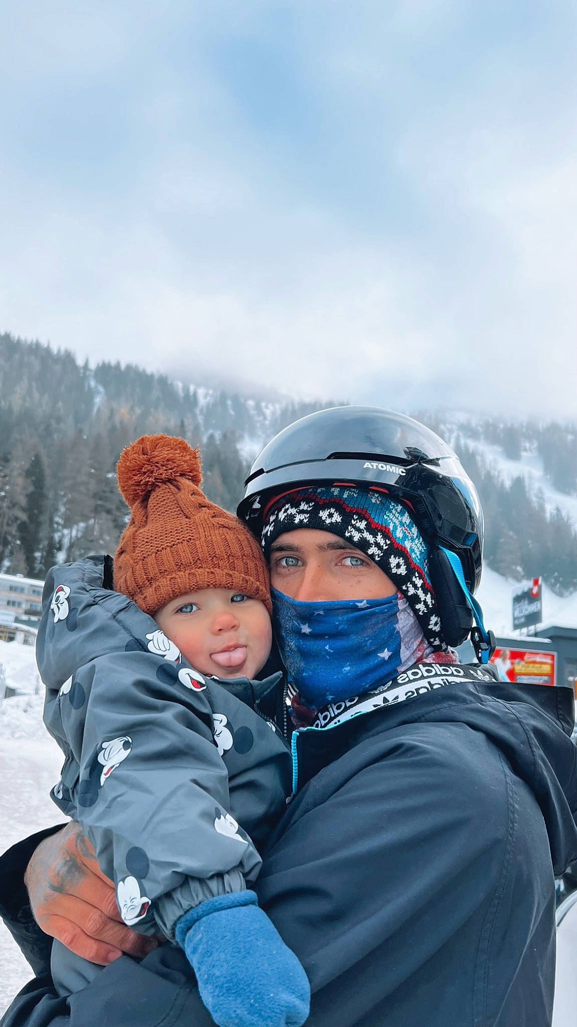 Henley joined the competition — help win amazing prizes! cloud, freezing, fun, glove, happy, headwear, ice_cap, jacket, landscape, leisure, mountain, mountain_range, person, personal_protective_equipment, recreation, sky, slope, snow, toddler, travel