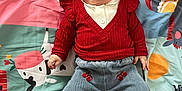 Mila participe au concours pour gagner de l'argent avec cette photo : animal_patterns, baby, barefoot, casual_clothing, cherry_patches, child, colorful, cute, denim_pants, happy, indoor, infant, lying_down, nature_patterns, play_mat, portrait, red_sweater, smiling, toys, young_child
