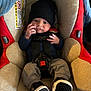 baby, bodypart, cap, car, clothing, couch, face, finger, footwear, furniture, hand, hat, head, pants, person, photography, portrait, shoe, transportation, vehicle