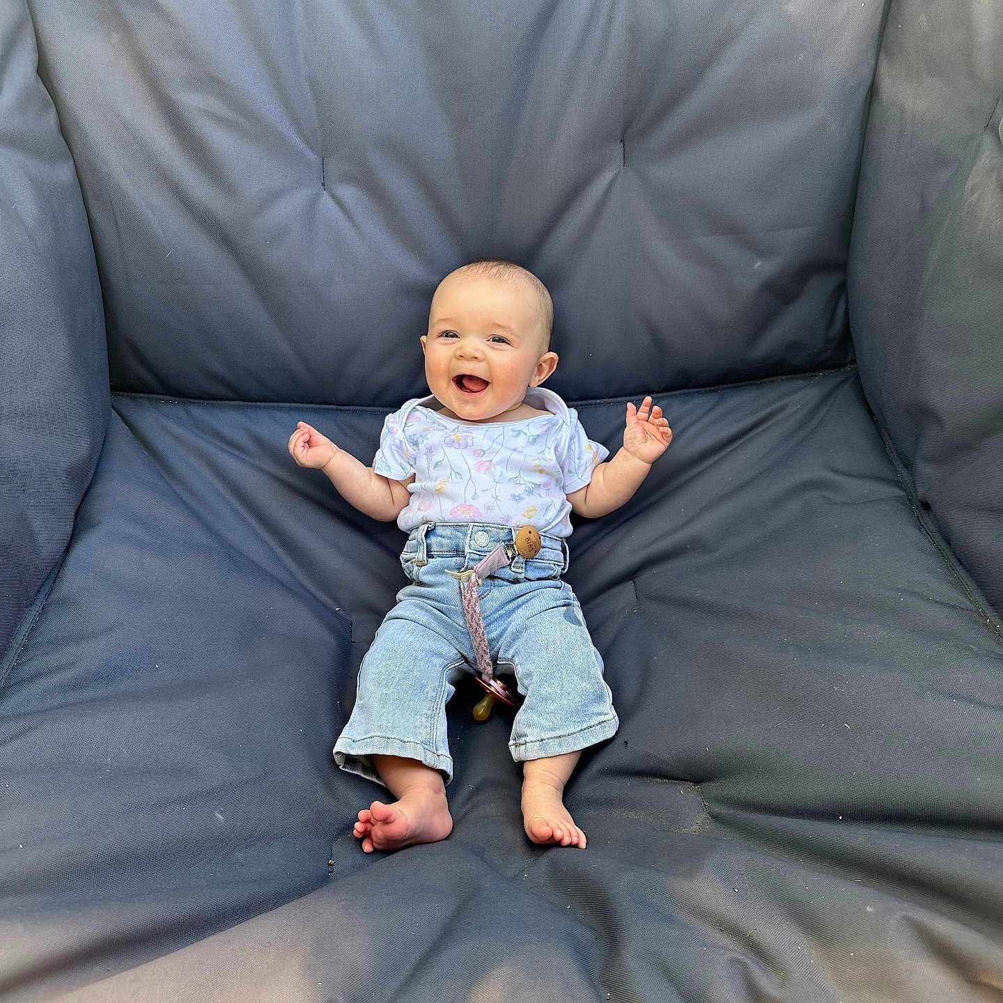 Paisley joined the competition — help win amazing prizes! baby, chair, clothing, coat, couch, cushion, face, footwear, furniture, happy, head, homedecor, jacket, jeans, pants, person, photography, portrait, shoe, sitting